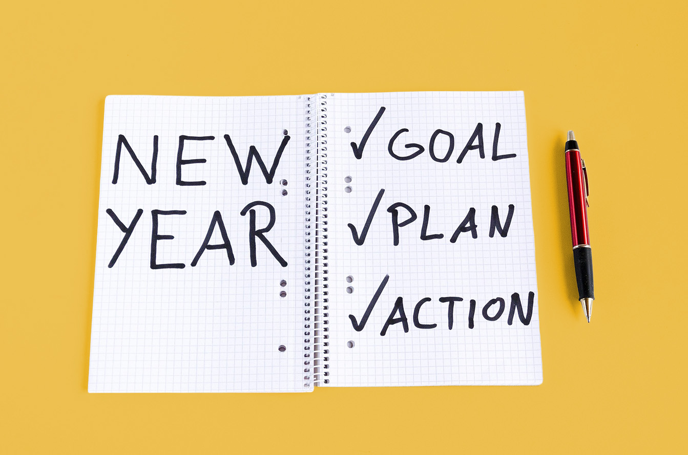 Notebook showing new year goals and plans representing a reset in dance studio marketing strategy.