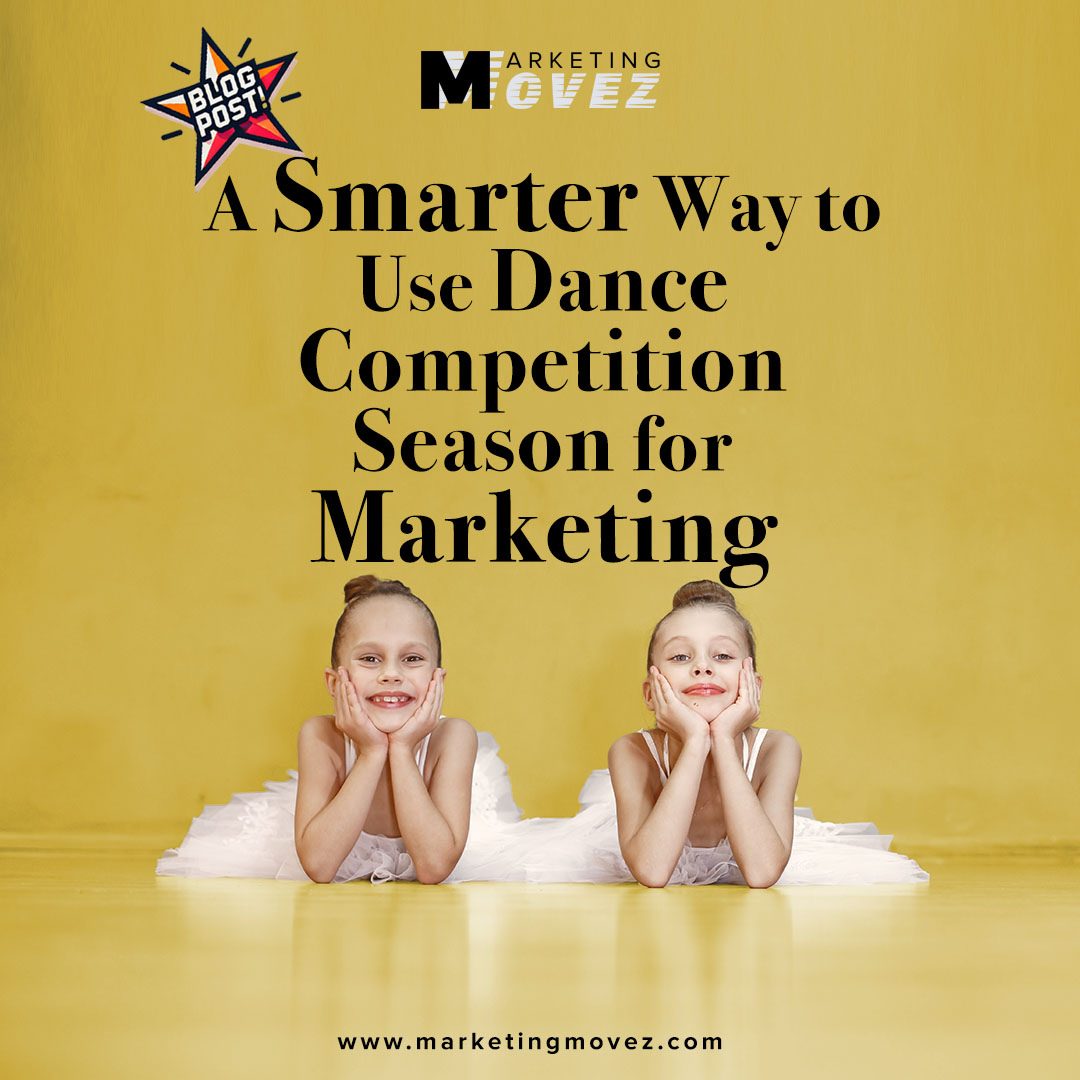 Two young ballet dancers resting on the studio floor during rehearsal, representing dance competition season marketing and studio culture.