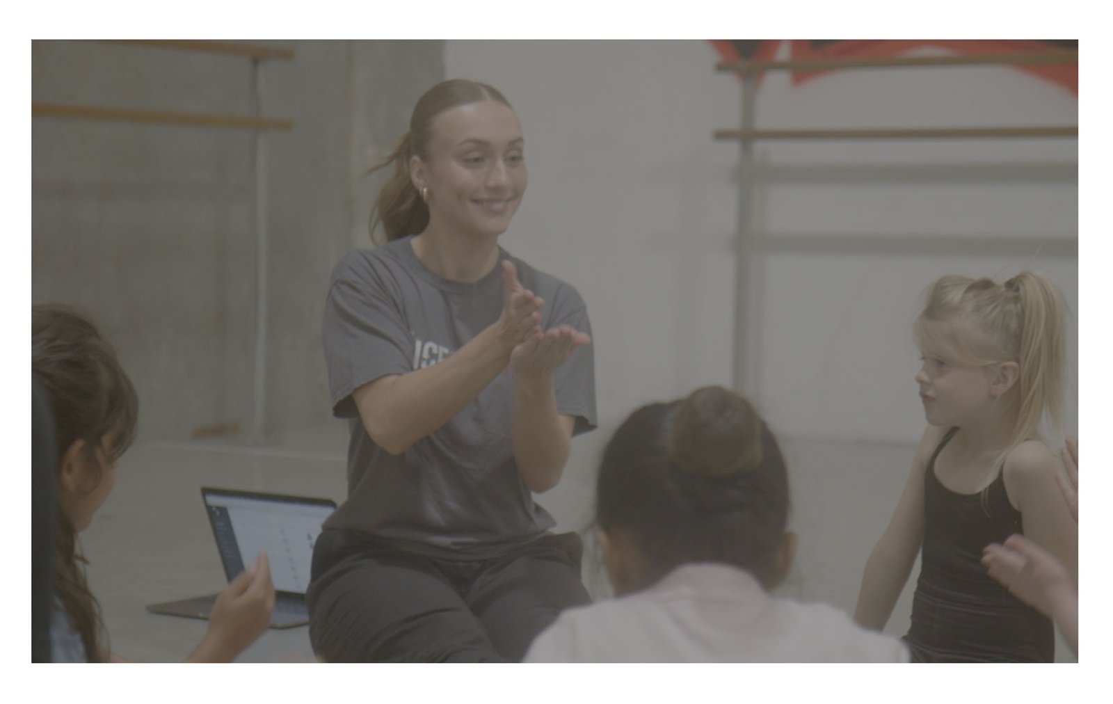 Dance teacher leading young students during a class at Dance Xpressions